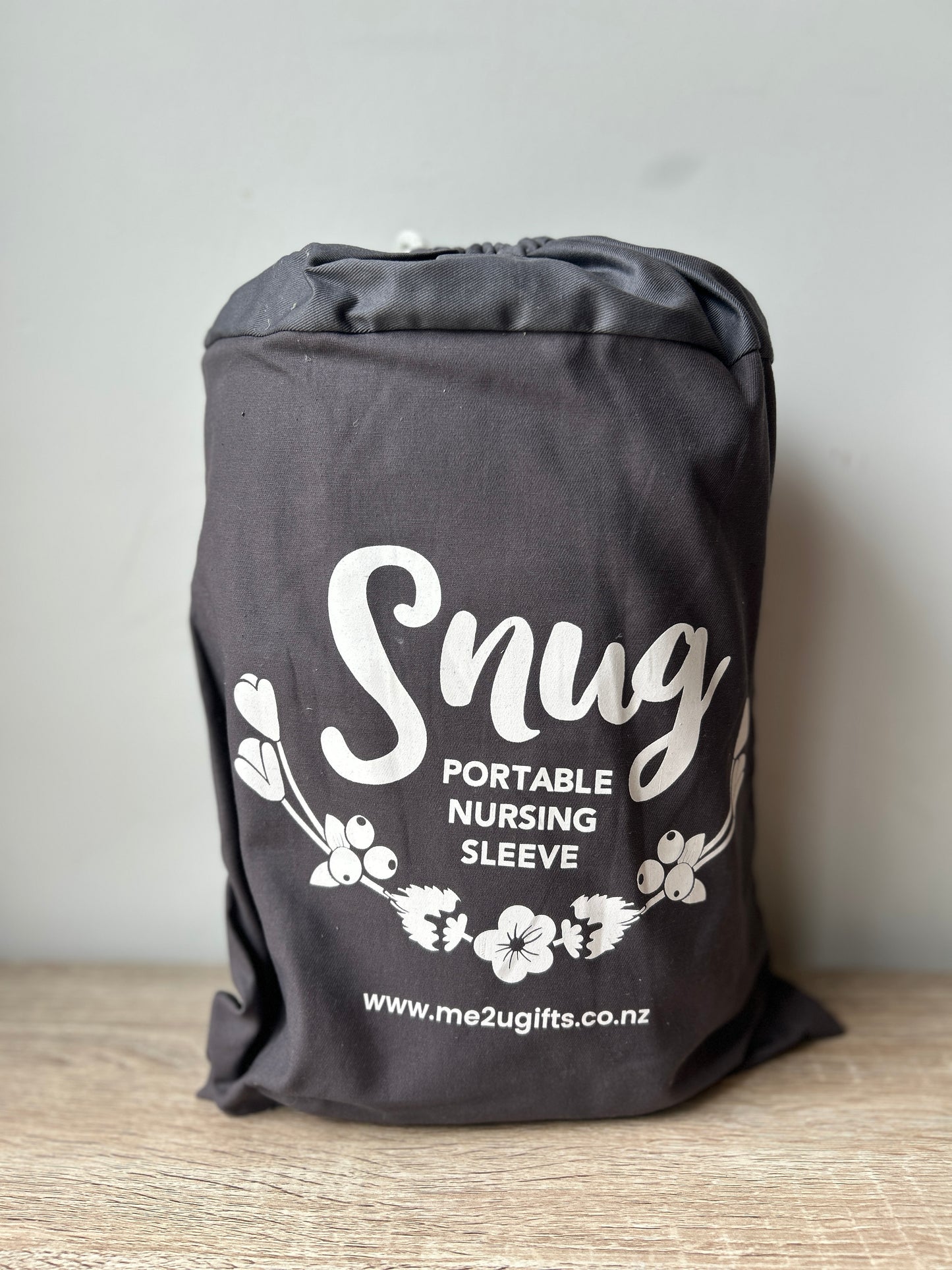 Snug portable nursing sleeve